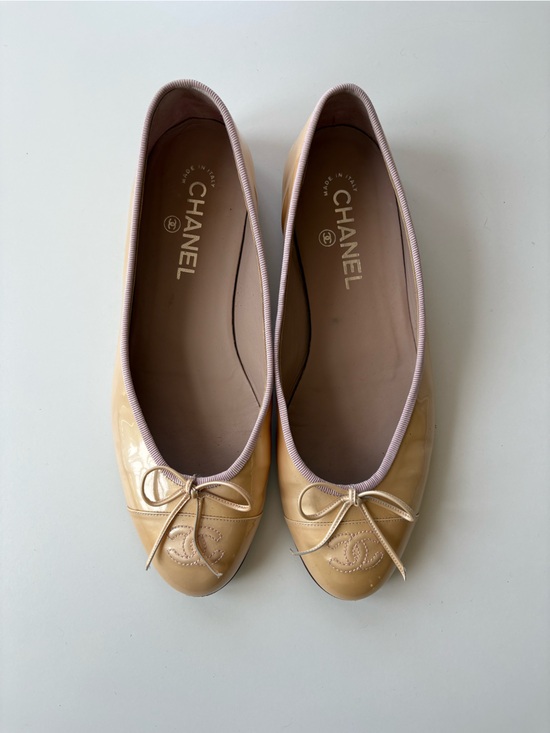 CHANEL Shoes - CHANEL Beige Patent Leather Bow Ballet Flats